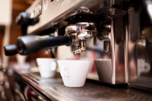 An image of an espresso machine with a cup of coffee