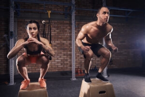 CrossFit athlete in action performing a high-intensity exercise