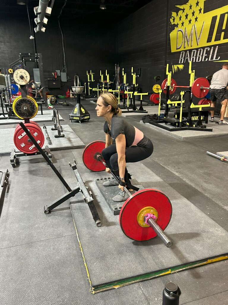 Woman doing deadlifts